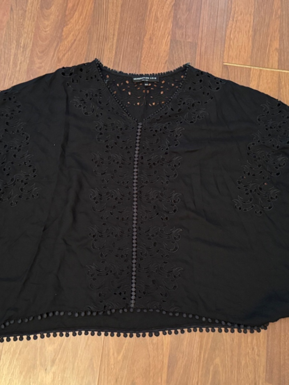 Generation Love Black, eyelit, boho blouse w/ pom pom trim -sz.xs/sm - EUC
